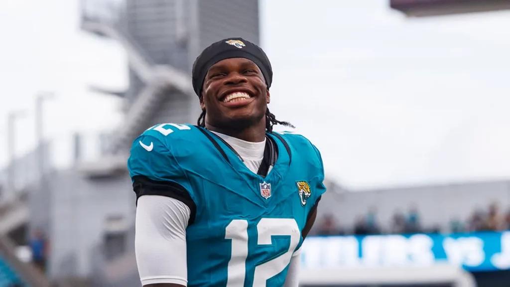 https://blog.scplaybook.com.au/wp-content/uploads/2025/09/travis-hunter-smile-82825-1024x576.webp
